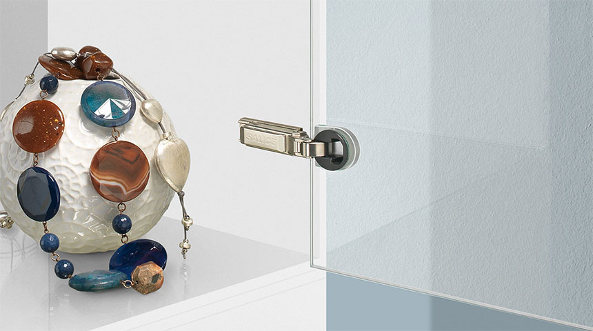 Salice Series 200 glass hinge fitted to a glass cabinet door